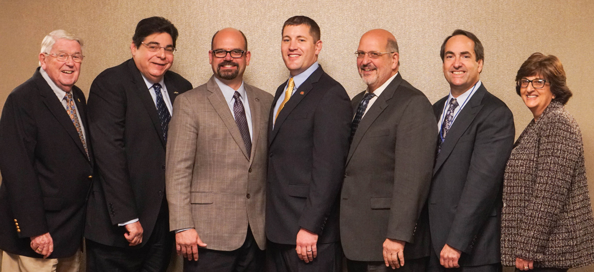 Pictured left to right: Kenneth Padgett, Frank Nicchi, Michael Mestan, Jason Brown, Louis Lupinacci, Bruce Silber, and Mariangela Penna